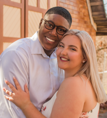 The couple's love shines through in this sweet embrace.
